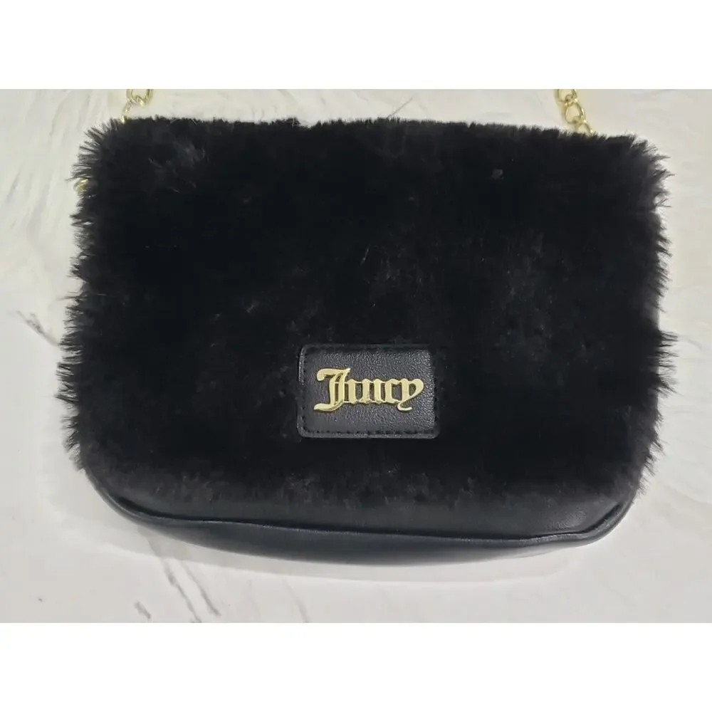 Juicy Couture measures approx